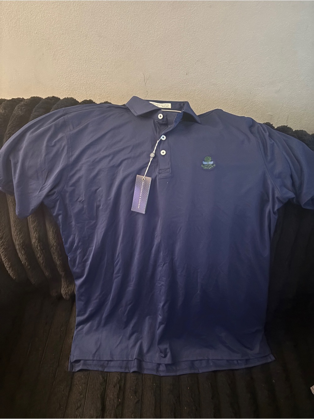 Men's Polo Shirt in Deep Blue with Subtle Embroidered Emblem